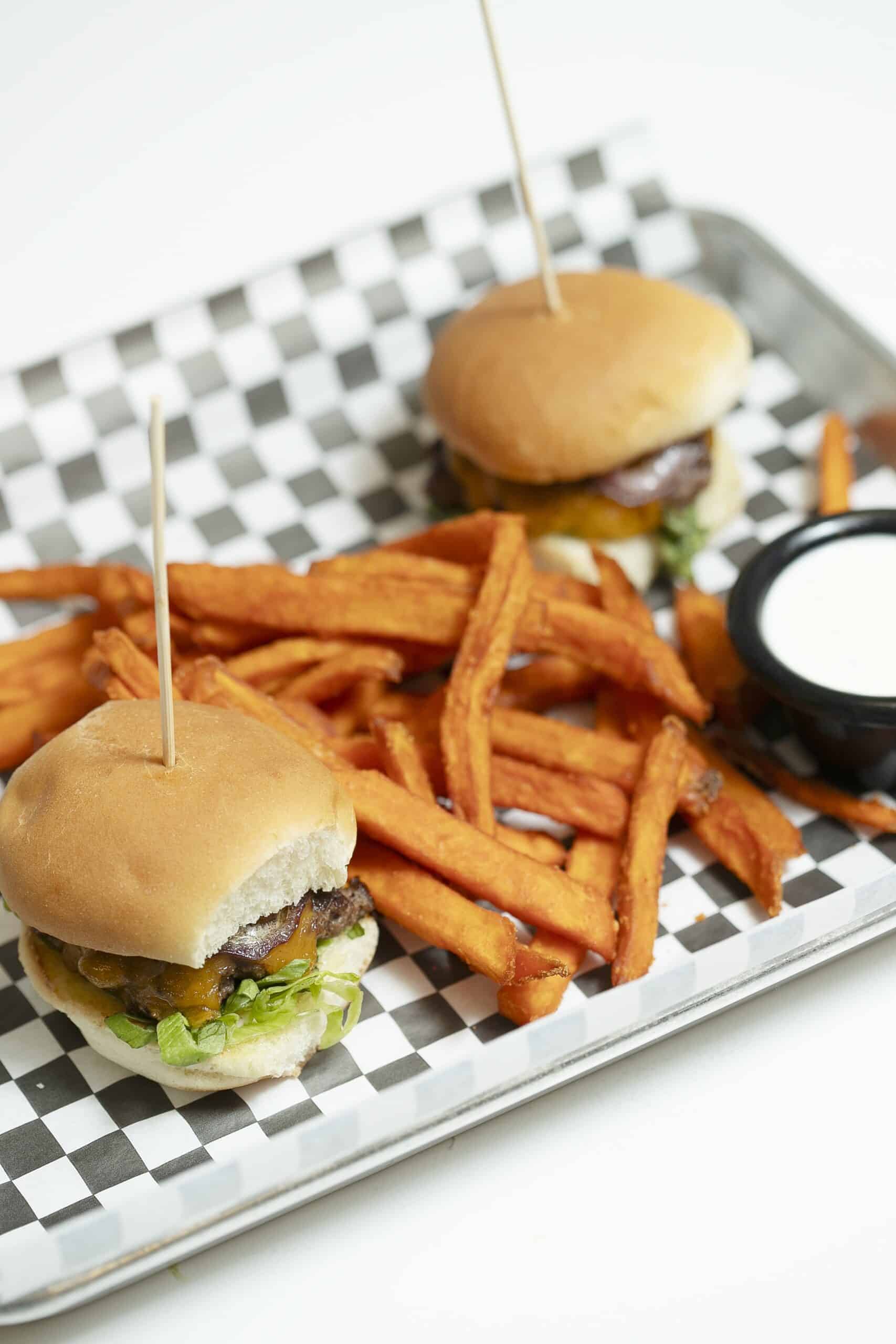 Sliders from 24 Taps with french fries on the side